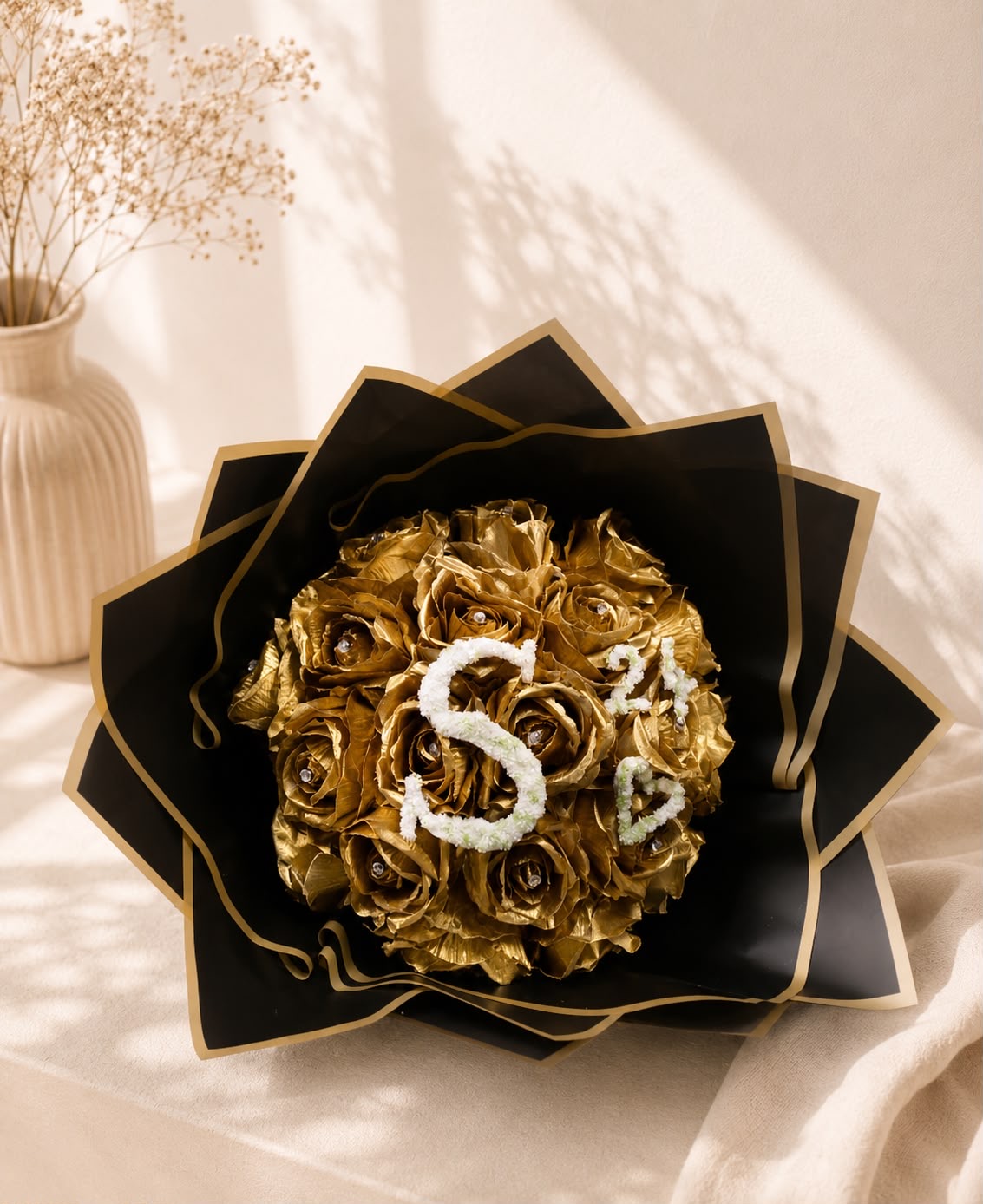Graduation gold rose bouquet with pearl 'S24' lettering in black and gold fan wrap