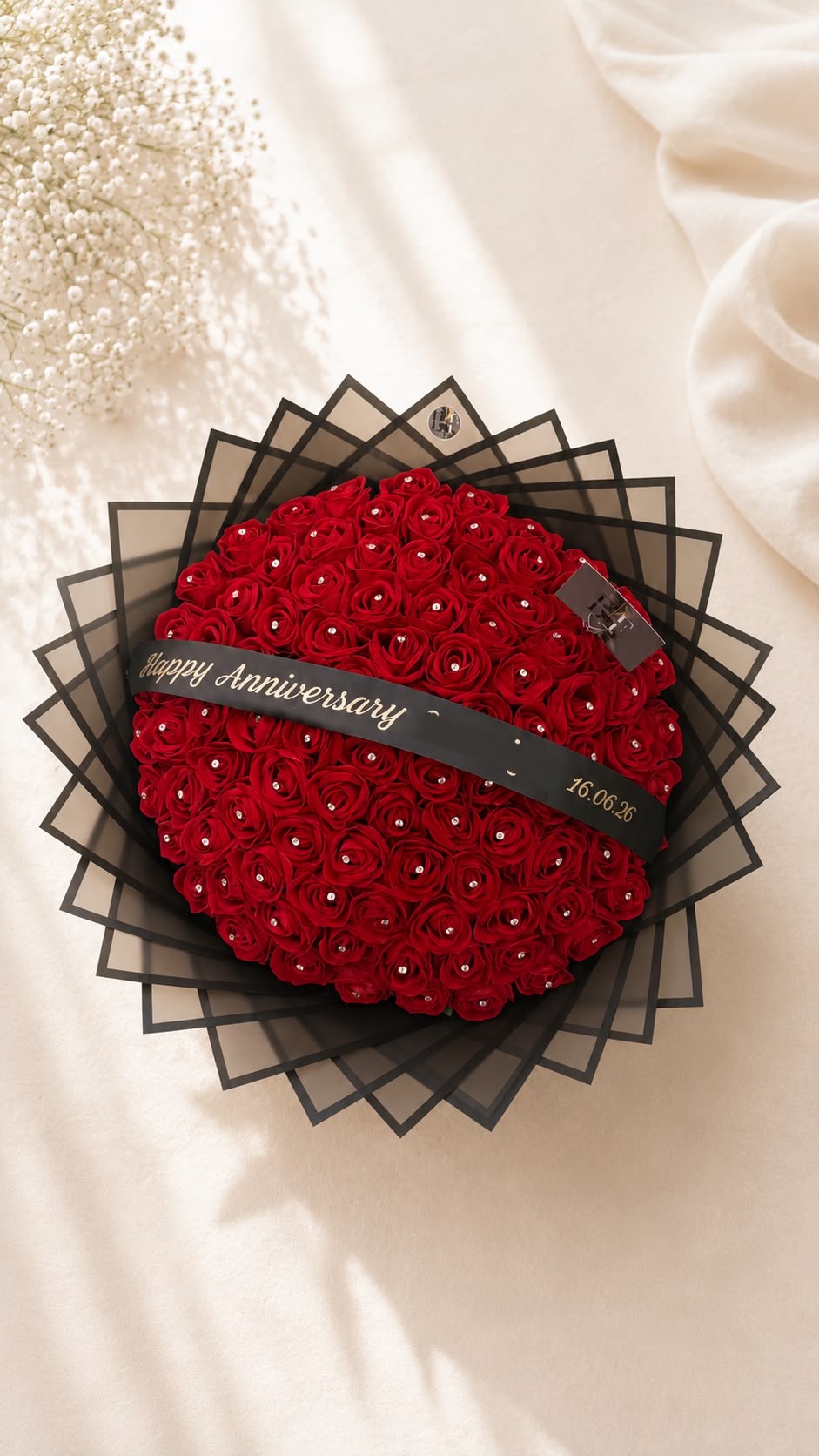 Grand anniversary red rose bouquet with diamanté pins and personalised black ribbon