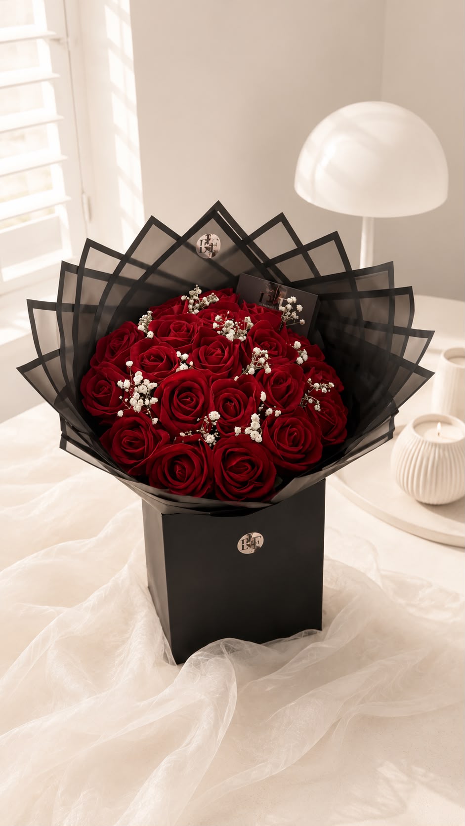 Premium red rose bouquet with baby's breath in signature black EF wrap and box