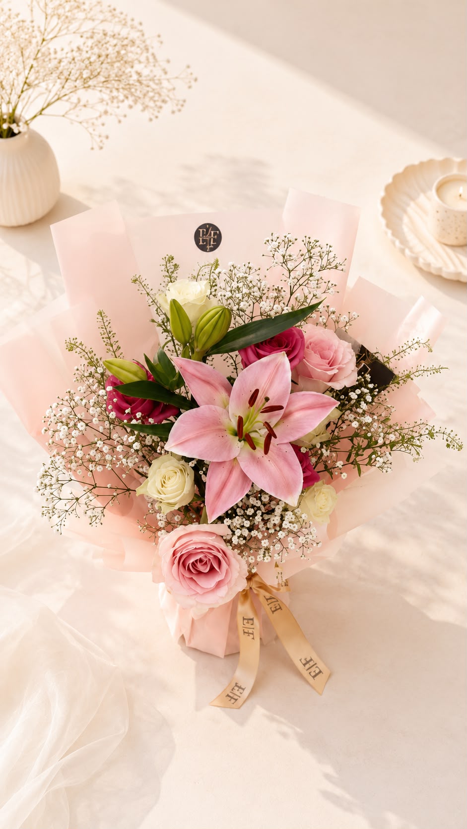 Luxury pink lily and rose bouquet with baby's breath in blush wrap and EF ribbon