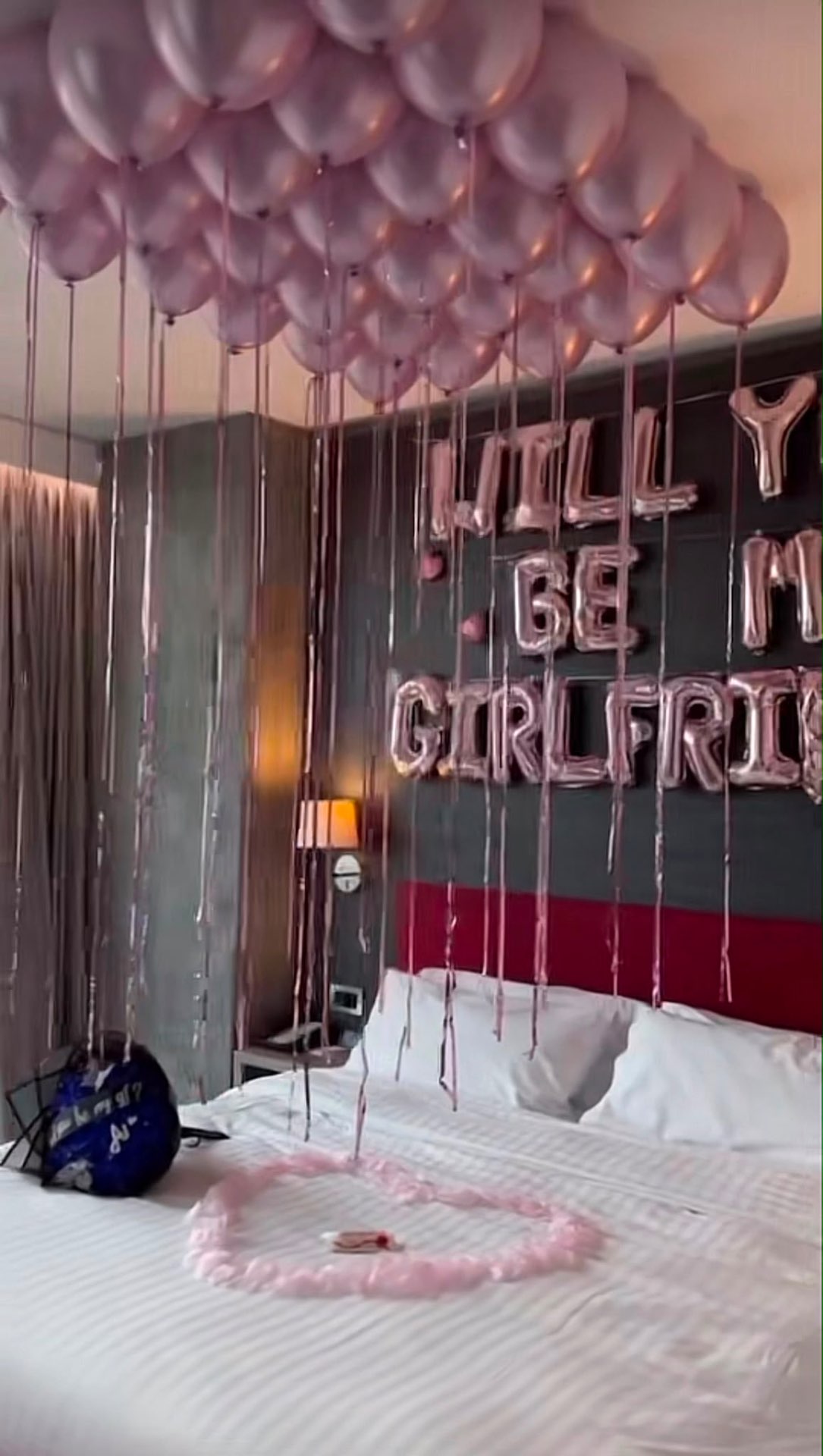 Will You Be My Girlfriend proposal with blush pink balloon canopy