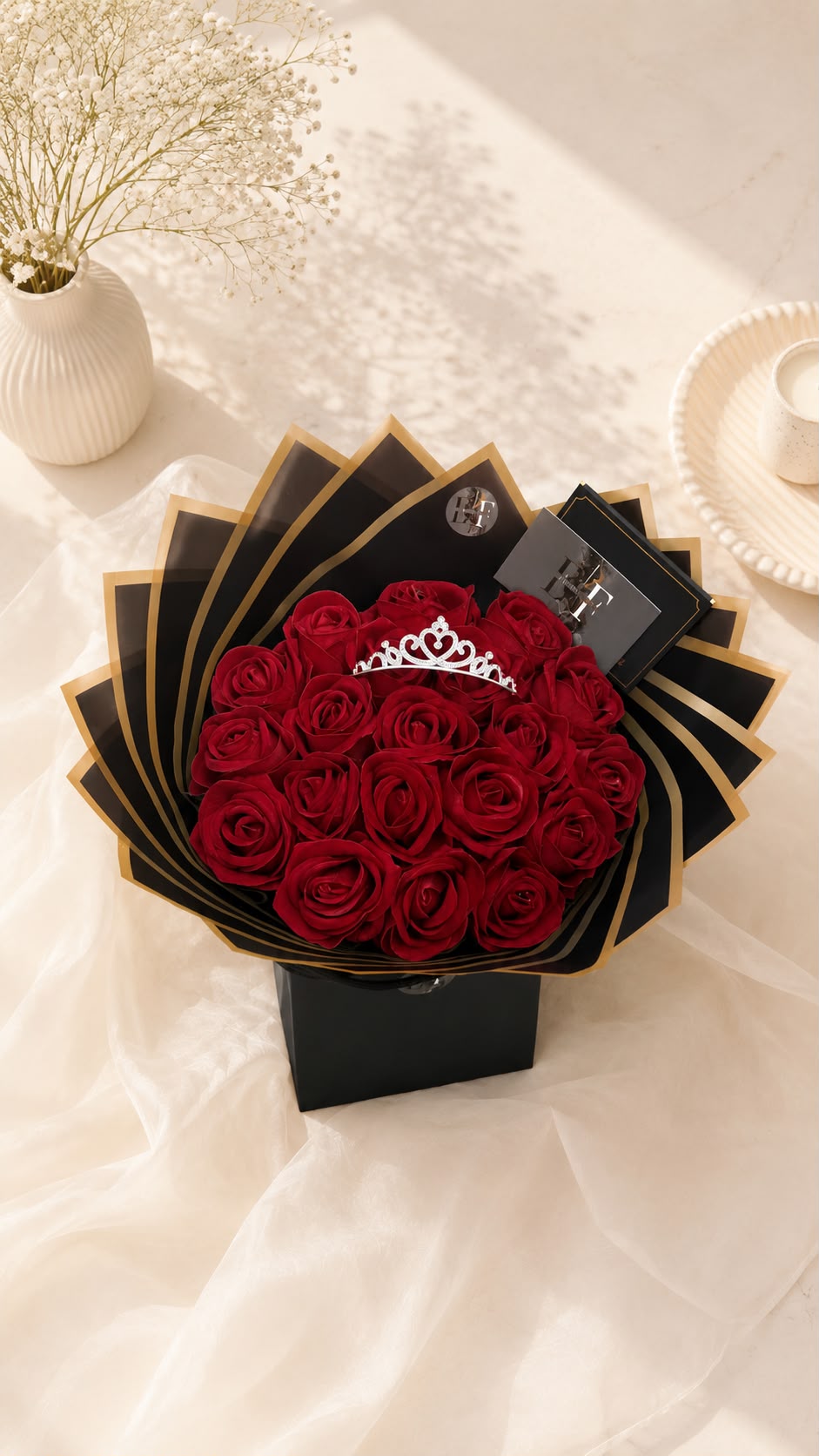 Luxury red rose bouquet with silver tiara in black and gold fan wrap