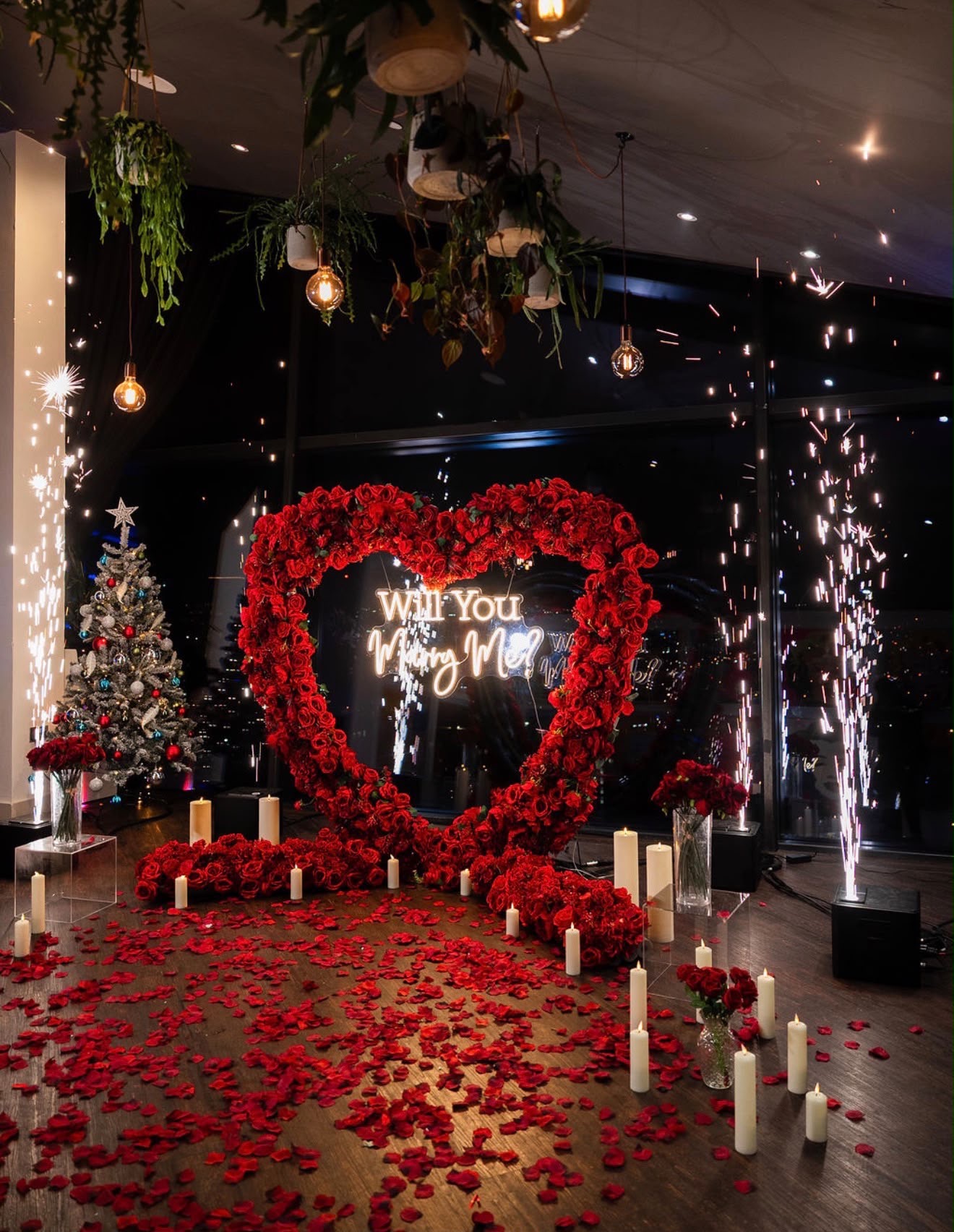 Luxury proposal love heart setup with rose display and indoor sparklers